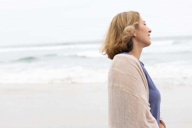 Vera McGrath in peaceful contemplation by the ocean